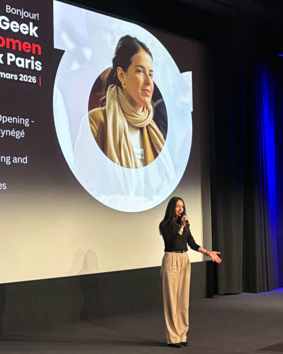 Marina Petrenko, founder of OutGeek Women in Tech, speaking on stage at OutGeek Women in Tech Paris, March 2026